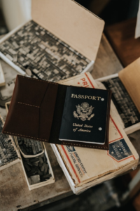 a passport placed on top of two boxes on a table