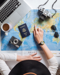 a person pointing to a destination on the map