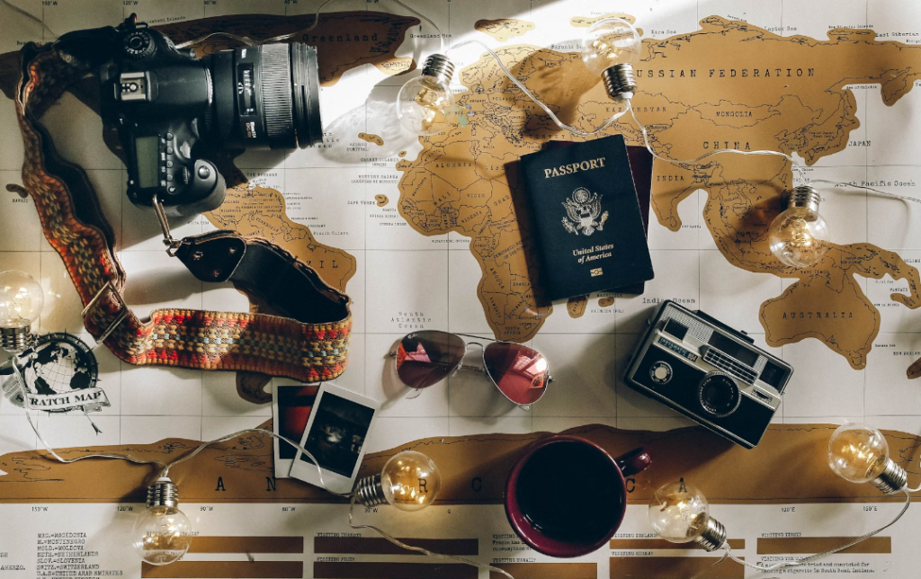 Travel tech scattered on a world map.
