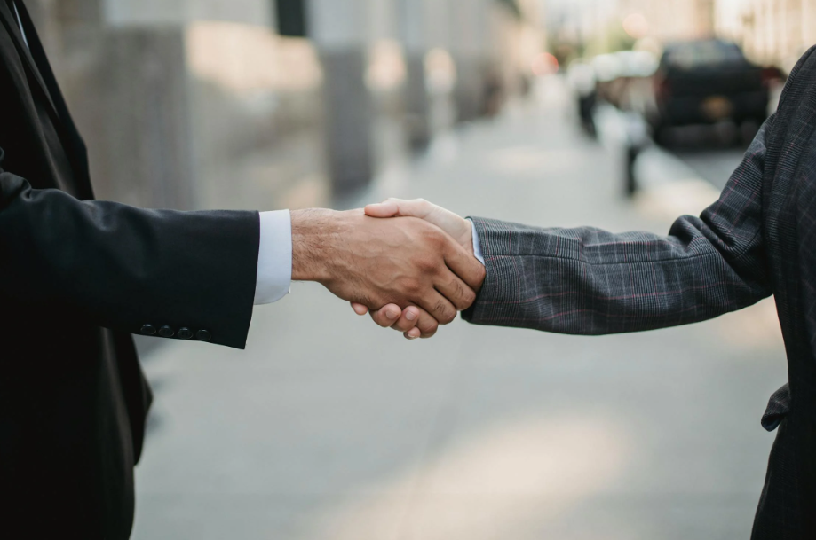 Two people networking while traveling. 