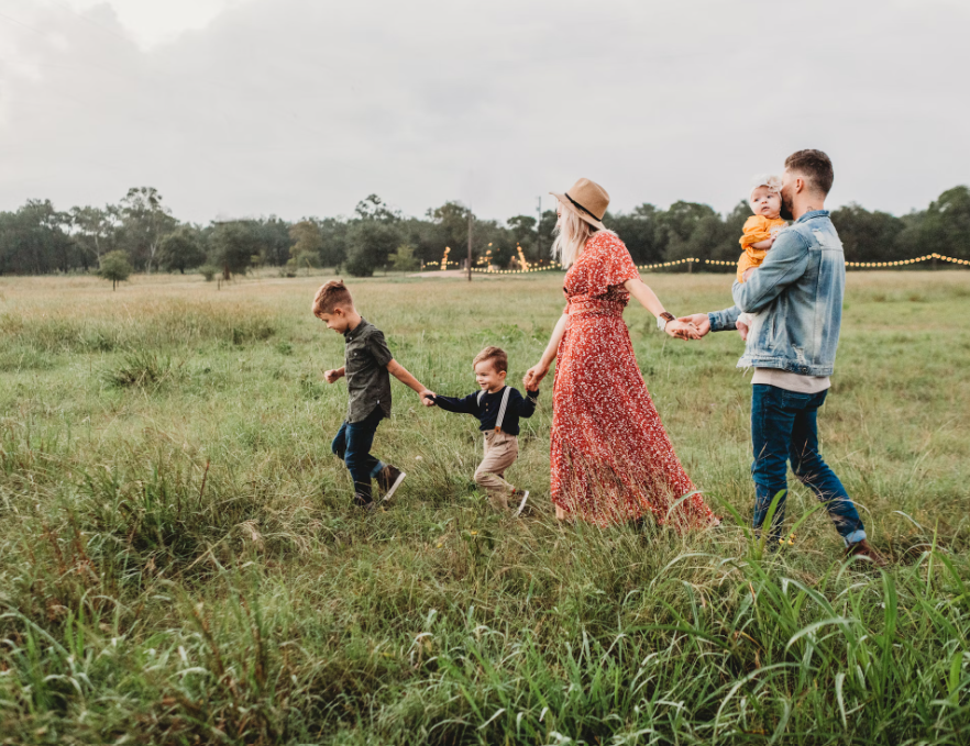 A family vacationing after using urgent passport renewal service.