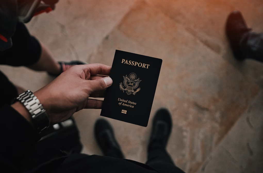 A person holding a passport.