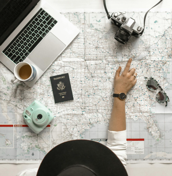 A person pointing at a location on a map.