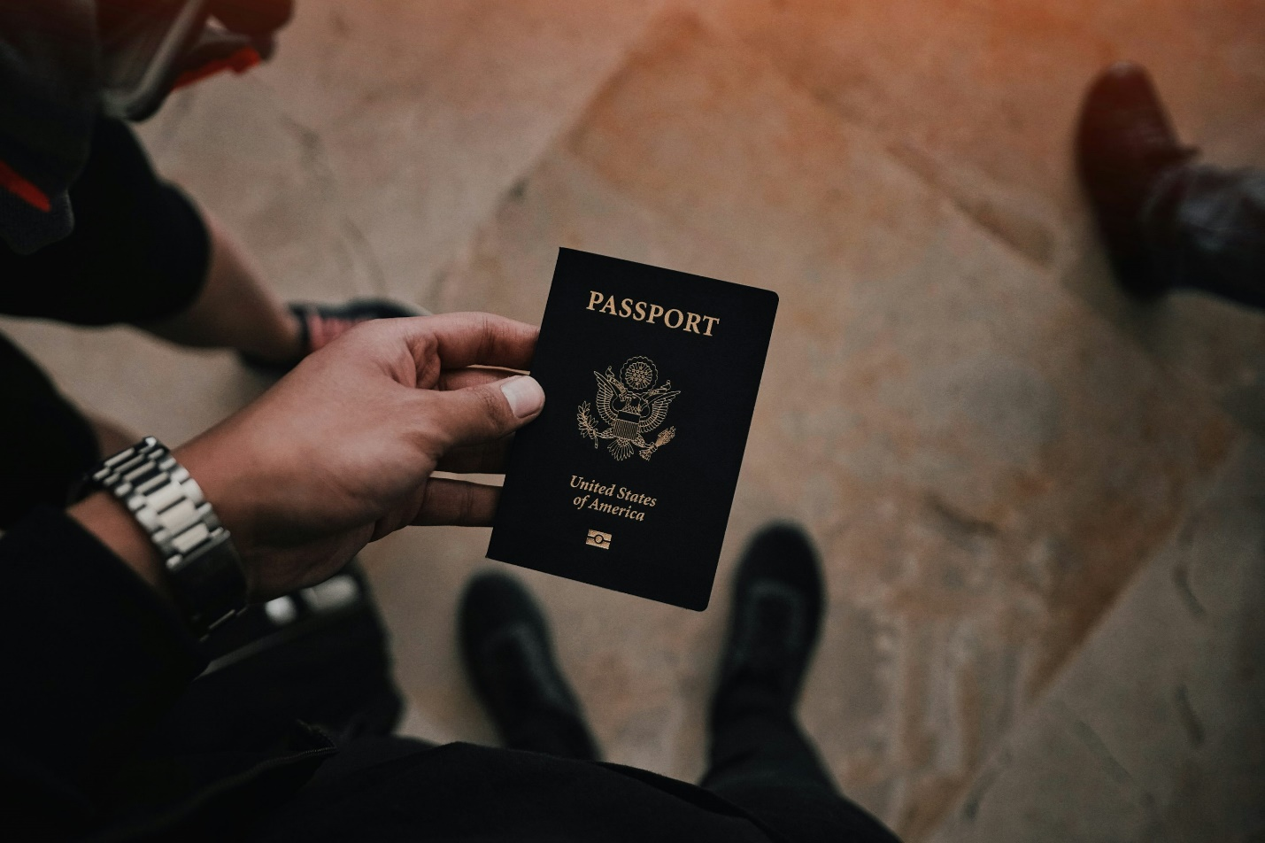 an individual holding their American passport