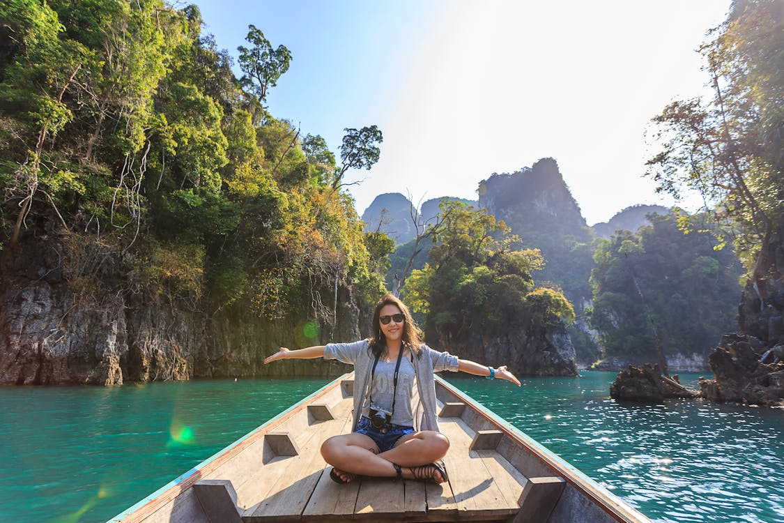 a woman sitting in a boat 